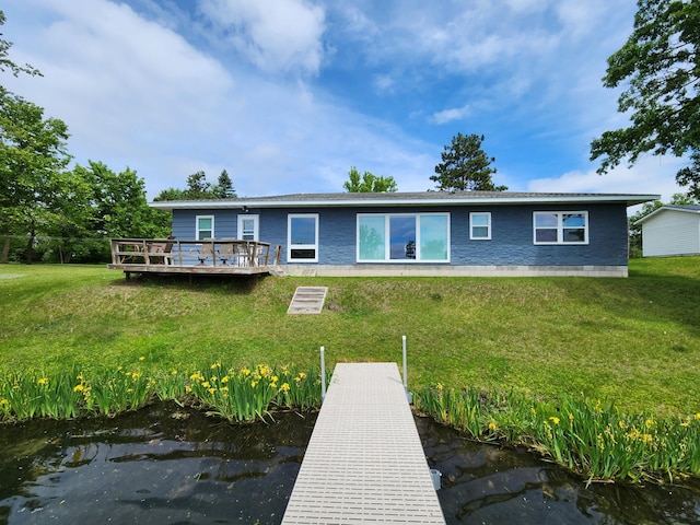 207 Mill Rd, Park Rapids, MN 56470 - rear view of property with a lawn and a deck