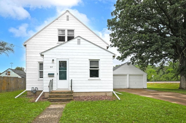913 12th Ave SE, Austin, MN 55912 - view of front of house with a garage and an outdoor structure