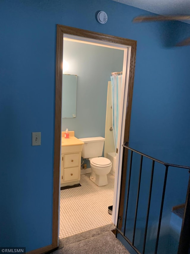 7236 72nd Ln N Unit 202, Brooklyn Park, MN 55428 - full bathroom with vanity, tile patterned floors, and shower / bathtub combination with curtain