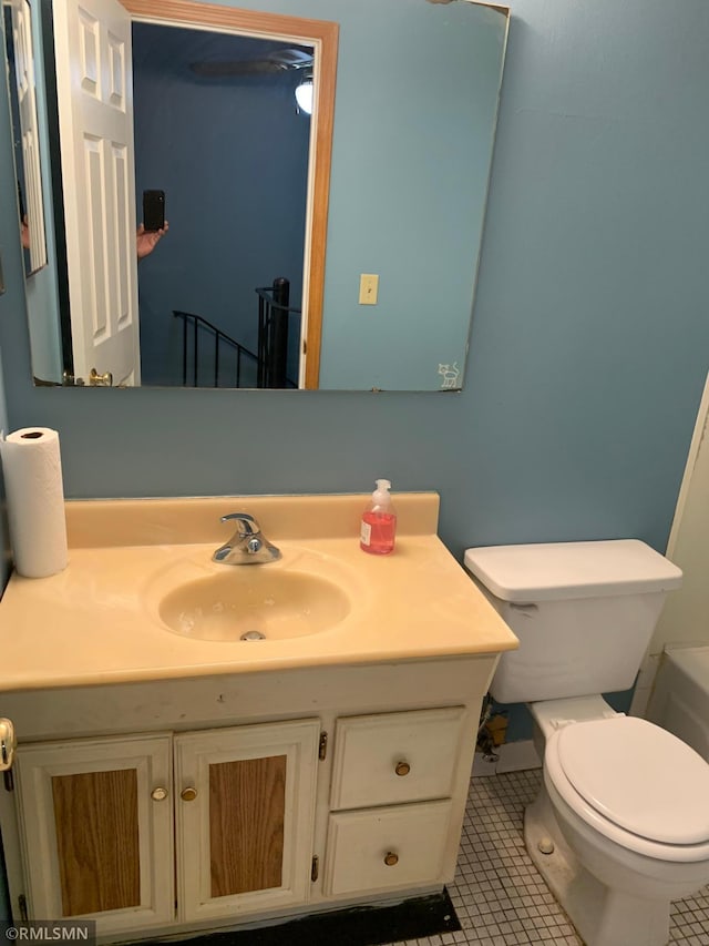 7236 72nd Ln N Unit 202, Brooklyn Park, MN 55428 - bathroom with vanity and tile patterned floors