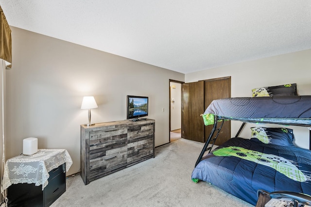 4133 88th Ave NE, Blaine, MN 55014 - bedroom featuring light carpet and a closet