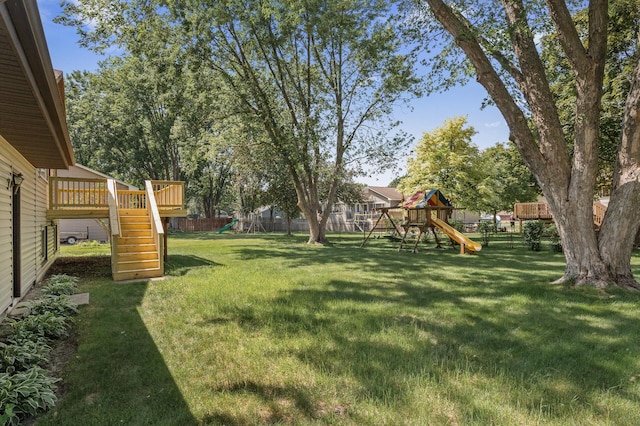 4133 88th Ave NE, Blaine, MN 55014 - view of yard featuring a playground, stairway, and a wooden deck