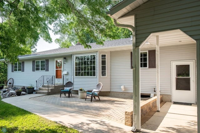 15544 60th Ave S, Riverton Twp, MN 56547 - rear view of house featuring a patio area