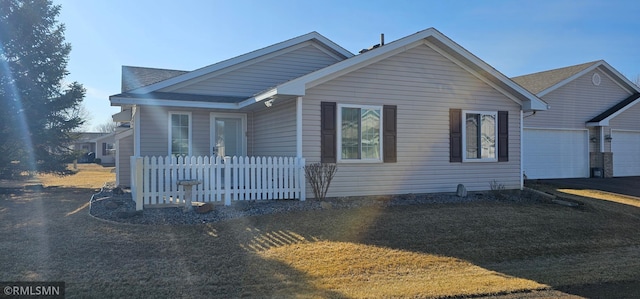 13046 Brookside Ln N, Rogers, MN 55374 - view of front of home with a garage and asphalt driveway