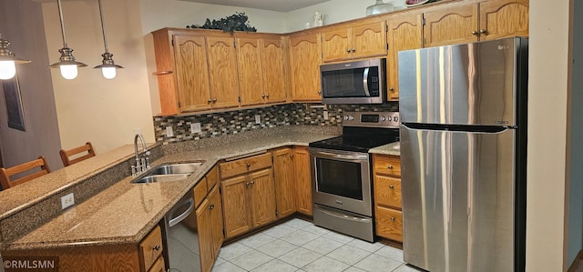 13046 Brookside Ln N, Rogers, MN 55374 - kitchen featuring stainless steel appliances, a peninsula, decorative backsplash, light stone countertops, and light tile patterned floors
