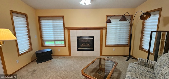 13046 Brookside Ln N, Rogers, MN 55374 - carpeted living room featuring a fireplace and baseboards