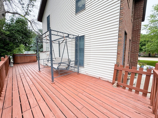 301 4th Ave SE, Pelican Rapids, MN 56572 - wooden deck with a hot tub