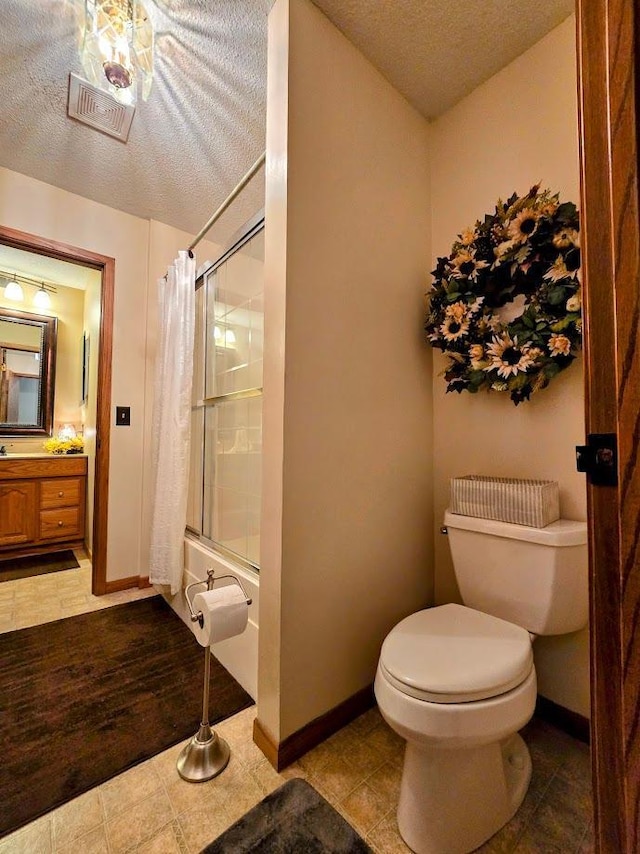 902 6th Ave SE, Pipestone, MN 56164 - bathroom featuring a textured ceiling, vanity, and shower / bath combo