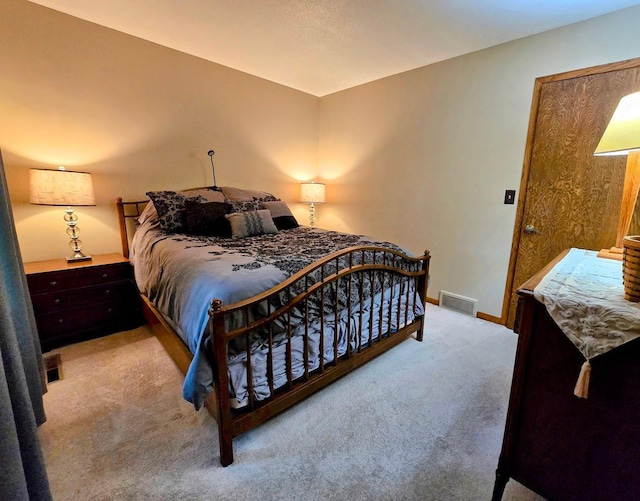 902 6th Ave SE, Pipestone, MN 56164 - carpeted bedroom with baseboards
