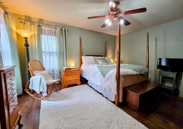 902 6th Ave SE, Pipestone, MN 56164 - bedroom with wood finished floors and a ceiling fan