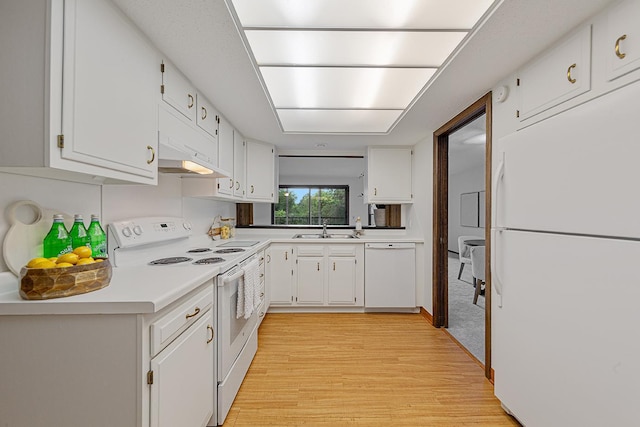 9700 Portland Ave S Unit 237, Bloomington, MN 55420 - kitchen with white appliances, light wood-style flooring, white cabinets, and light countertops