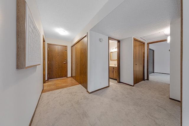 9700 Portland Ave S Unit 237, Bloomington, MN 55420 - hall featuring light colored carpet and a textured ceiling