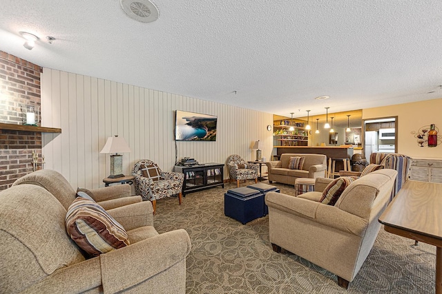9700 Portland Ave S Unit 237, Bloomington, MN 55420 - carpeted living room with a textured ceiling