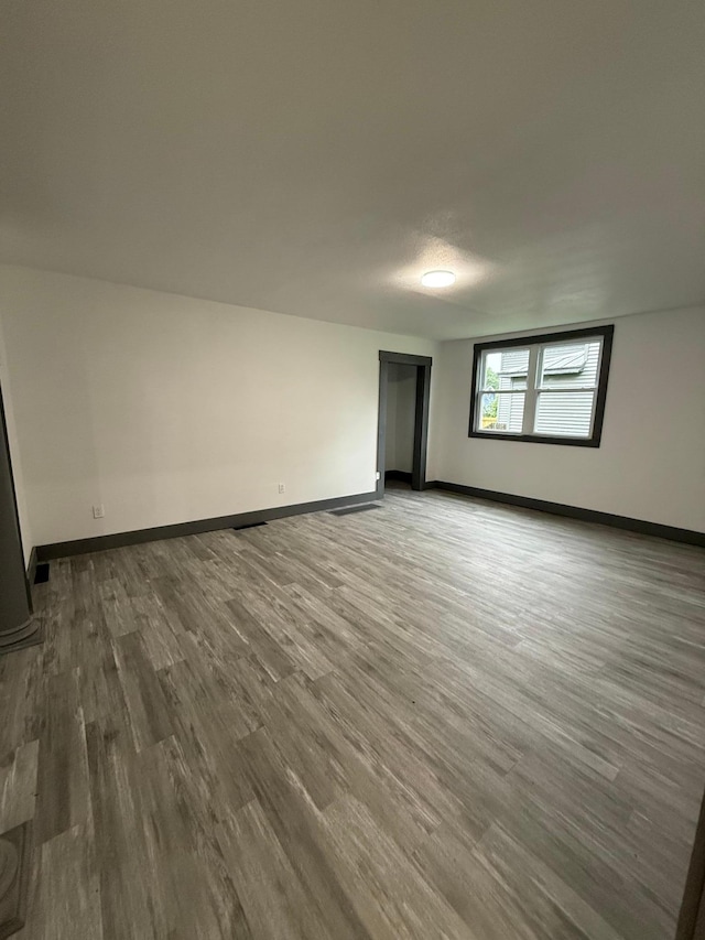 409 4th St W, Canby, MN 56220 - spare room featuring wood finished floors