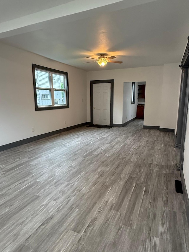 409 4th St W, Canby, MN 56220 - spare room featuring ceiling fan and wood finished floors
