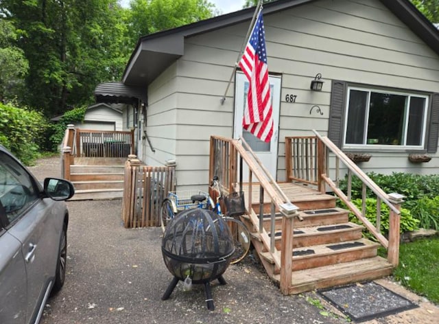 687 Dover St NE, Fridley, MN 55432 - view of front facade with an outdoor fire pit