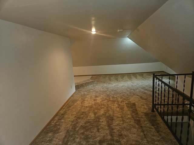 442 Cleveland Ave W, Winnebago, MN 56098 - additional living space with carpet floors and vaulted ceiling