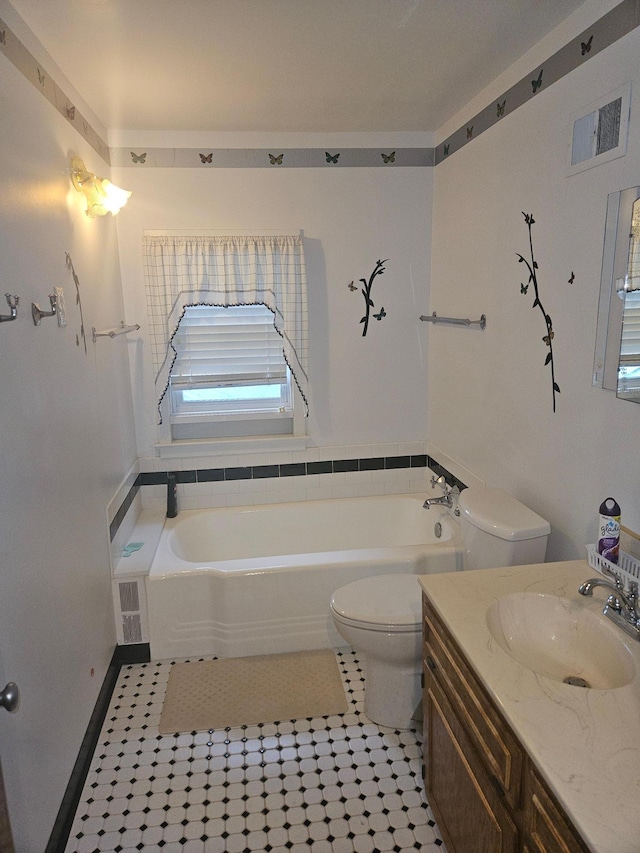 442 Cleveland Ave W, Winnebago, MN 56098 - bathroom featuring a garden tub, tile patterned flooring, and vanity