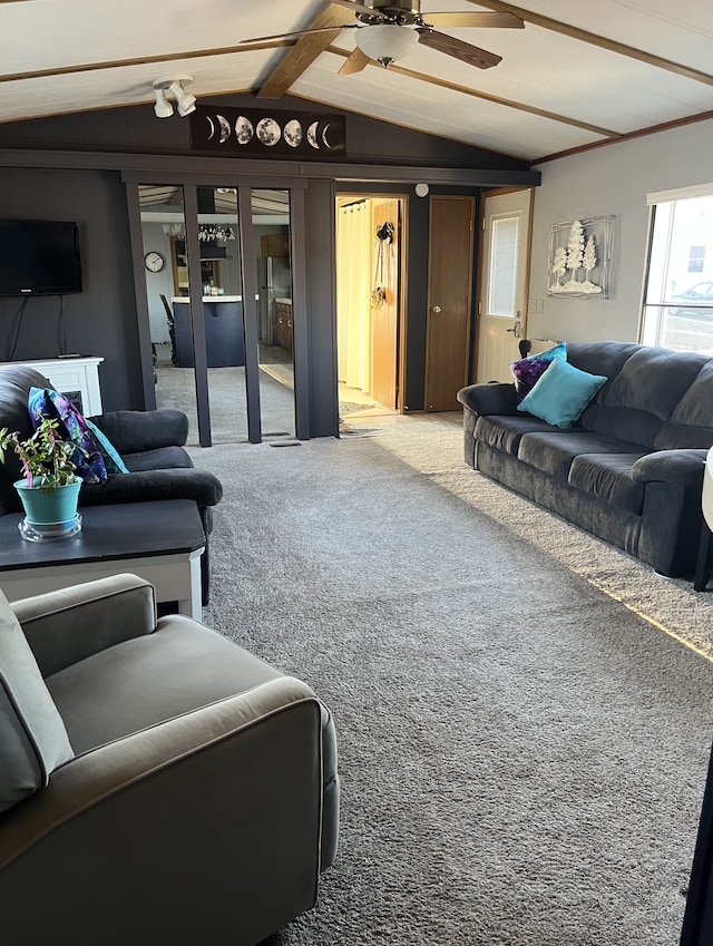 1323 Pine Tree Dr, Maplewood, MN 55119 - carpeted living area with vaulted ceiling and ceiling fan