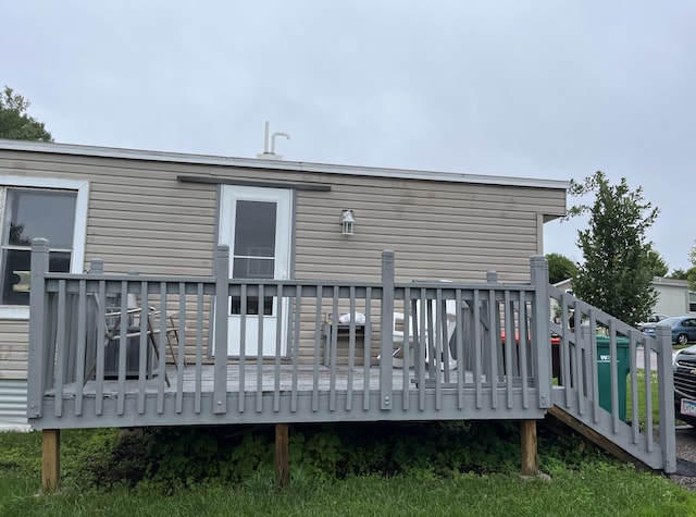 1323 Pine Tree Dr, Maplewood, MN 55119 - rear view of house with a wooden deck