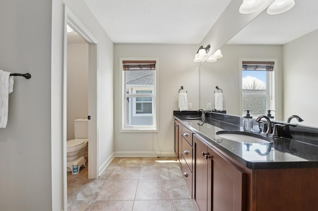 3608 Strawberry Ln, Chanhassen, MN 55331 - full bath with double vanity and tile patterned flooring