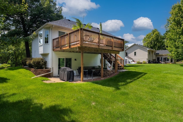 22615 Janero Ave N, Forest Lake, MN 55025 - back of property with a wooden deck, a patio, a yard, stairs, and roof with shingles