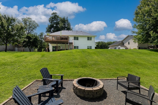 22615 Janero Ave N, Forest Lake, MN 55025 - back of house featuring an outdoor fire pit, stairs, a deck, and a lawn