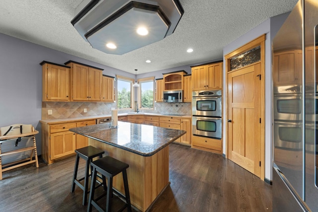 4802 102nd Trl N, Brooklyn Park, MN 55443 - kitchen with stainless steel appliances, a textured ceiling, dark wood finished floors, open shelves, and a kitchen island