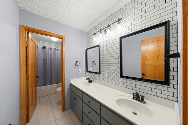 4802 102nd Trl N, Brooklyn Park, MN 55443 - full bath with double vanity, a textured ceiling, tile walls, shower / bath combo with shower curtain, and tile patterned floors