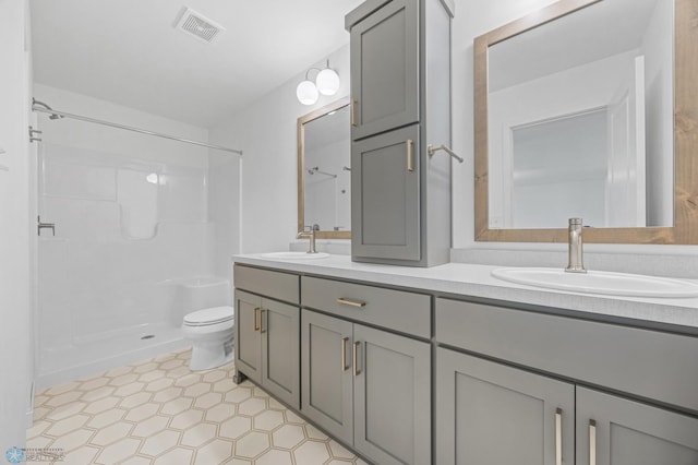 7326 28th St S, Fargo, ND 58104 - bathroom with double vanity and a shower
