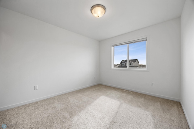 7326 28th St S, Fargo, ND 58104 - carpeted spare room with baseboards