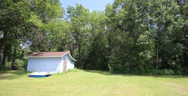 22379 519th Ln, Workman Twp, MN 55760 - view of green lawn with a shed