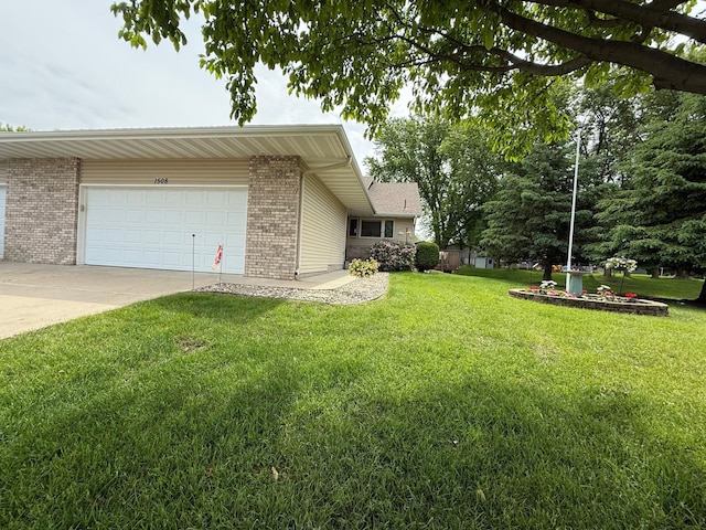 1508 Terrance Cir NE, New Prague, MN 56071 - view of property exterior with brick siding, an attached garage, a yard, and concrete driveway