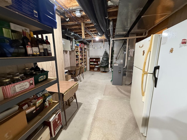 1508 Terrance Cir NE, New Prague, MN 56071 - unfinished below grade area with freestanding refrigerator and heating unit