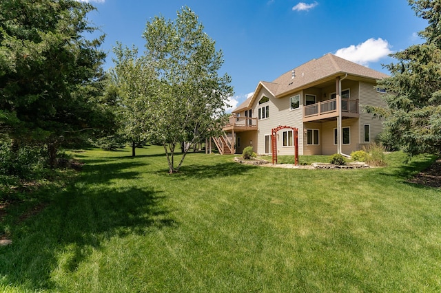3262 Jade Ct NE, Rochester, MN 55906 - rear view of property with stairs, a yard, and a deck
