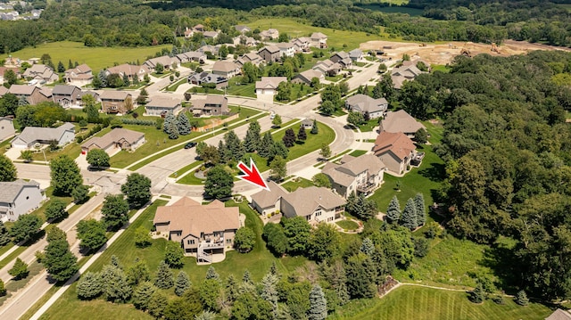 3262 Jade Ct NE, Rochester, MN 55906 - aerial perspective of suburban area featuring a forest