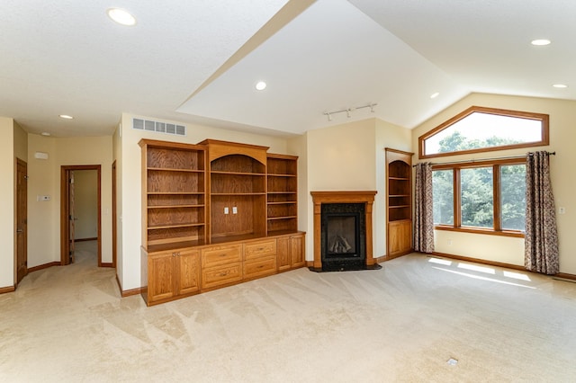 3262 Jade Ct NE, Rochester, MN 55906 - unfurnished living room with light colored carpet, vaulted ceiling, a fireplace, and recessed lighting