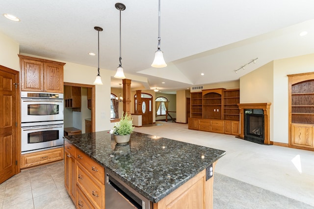 3262 Jade Ct NE, Rochester, MN 55906 - kitchen featuring double oven, light carpet, recessed lighting, a premium fireplace, and dark stone countertops