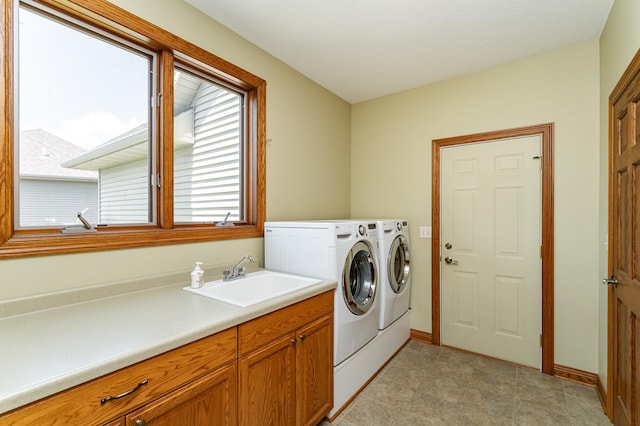 3262 Jade Ct NE, Rochester, MN 55906 - washroom featuring washer and clothes dryer and cabinet space