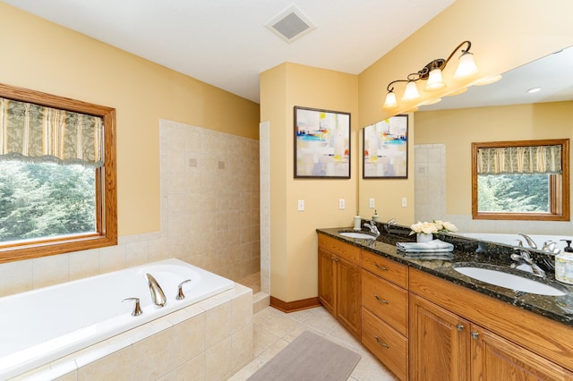 3262 Jade Ct NE, Rochester, MN 55906 - full bath with a garden tub, double vanity, and tile patterned flooring