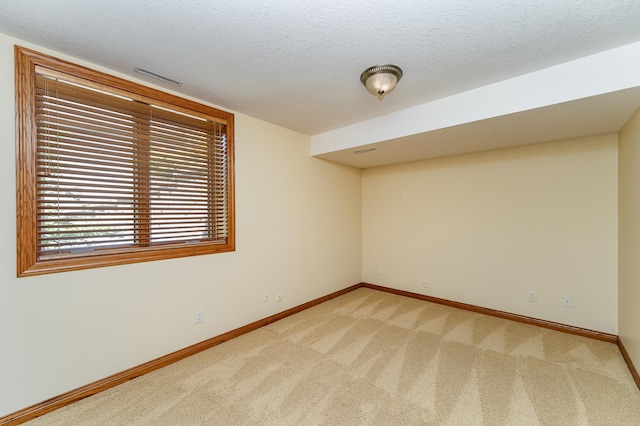 3262 Jade Ct NE, Rochester, MN 55906 - unfurnished room with light carpet and a textured ceiling
