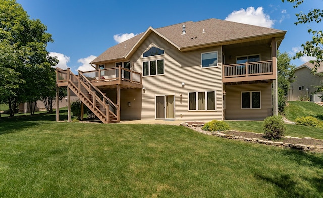 3262 Jade Ct NE, Rochester, MN 55906 - back of house featuring a yard, a deck, roof with shingles, and stairs