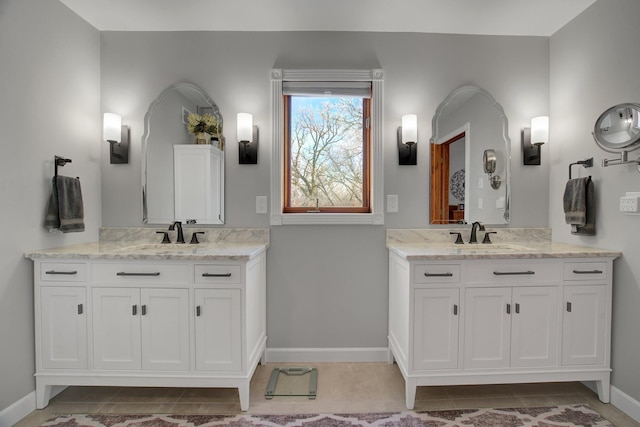 19319 380th St, Erhards Grove Twp, MN 56534 - full bath featuring two vanities and tile patterned floors