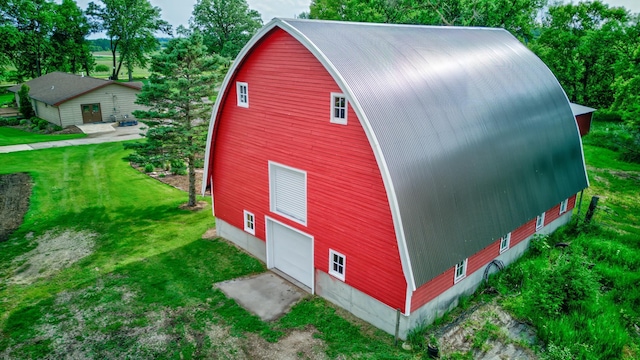 19319 380th St, Erhards Grove Twp, MN 56534 - view of barn featuring a lawn and driveway