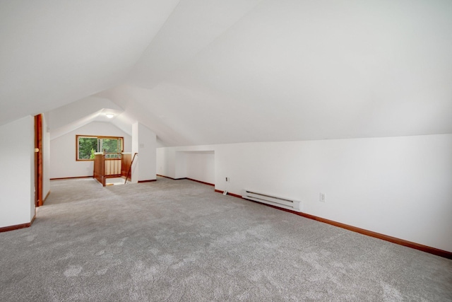 1196 Minnehaha Ave E, Saint Paul, MN 55106 - additional living space featuring a baseboard radiator, vaulted ceiling, and carpet