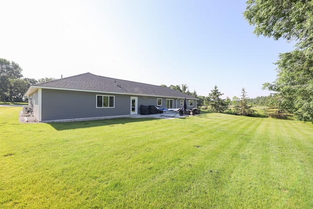 2060 Rosewood Ln SE, Alexandria, MN 56308 - back of house with a lawn
