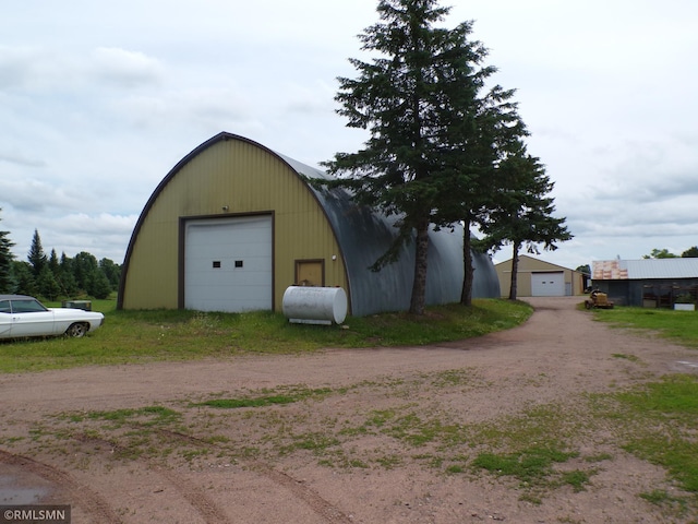 45248 State Highway 48, Clover Twp, MN 55037 - detached garage with driveway