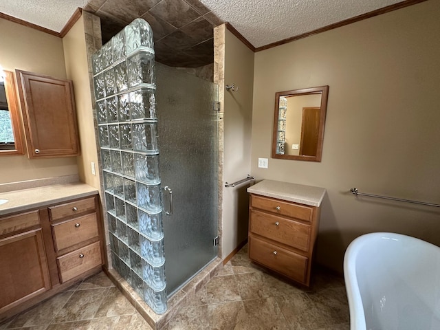 1702 15th St SW, Willmar, MN 56201 - full bathroom featuring ornamental molding, vanity, a shower stall, a textured ceiling, and a soaking tub