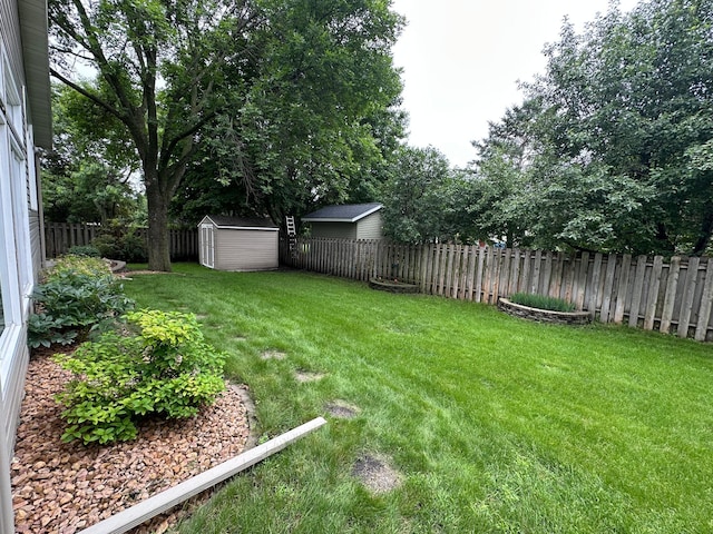 1702 15th St SW, Willmar, MN 56201 - fenced backyard with a storage shed