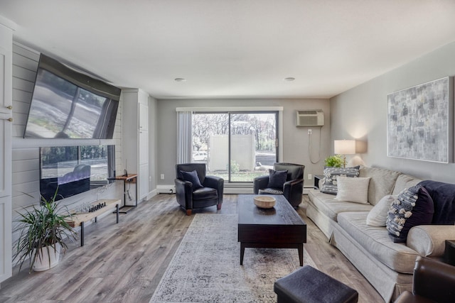 10501 Cedar Lake Rd Unit 217, Minnetonka, MN 55305 - living room featuring wood finished floors and an AC wall unit